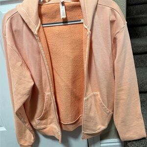 Skims French Terry Zip Up Hoodie in Cantaloupe size Small